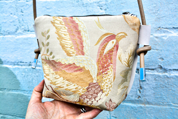 Silk Bird Leather cross-body bag