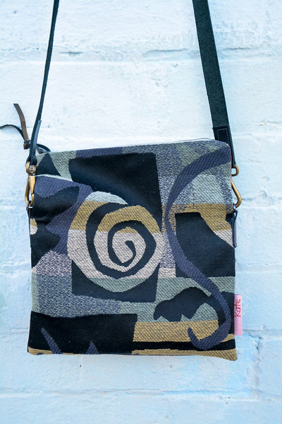 Sleeve Leather Piece/Black Swirl Fold over bag